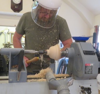 The turner on the club lathe for the day. Ted Hogben